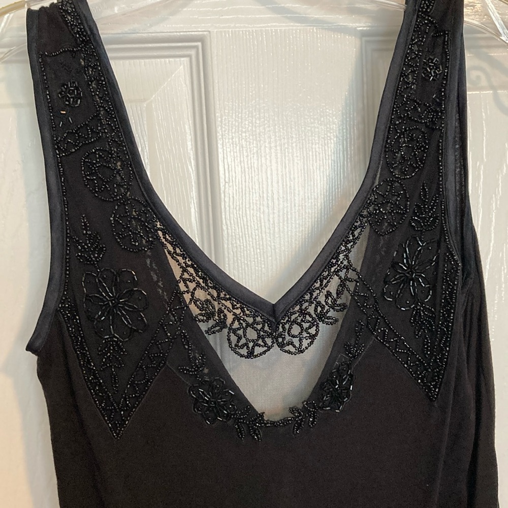 Beautiful, black tank top with lace and beading. Size large.